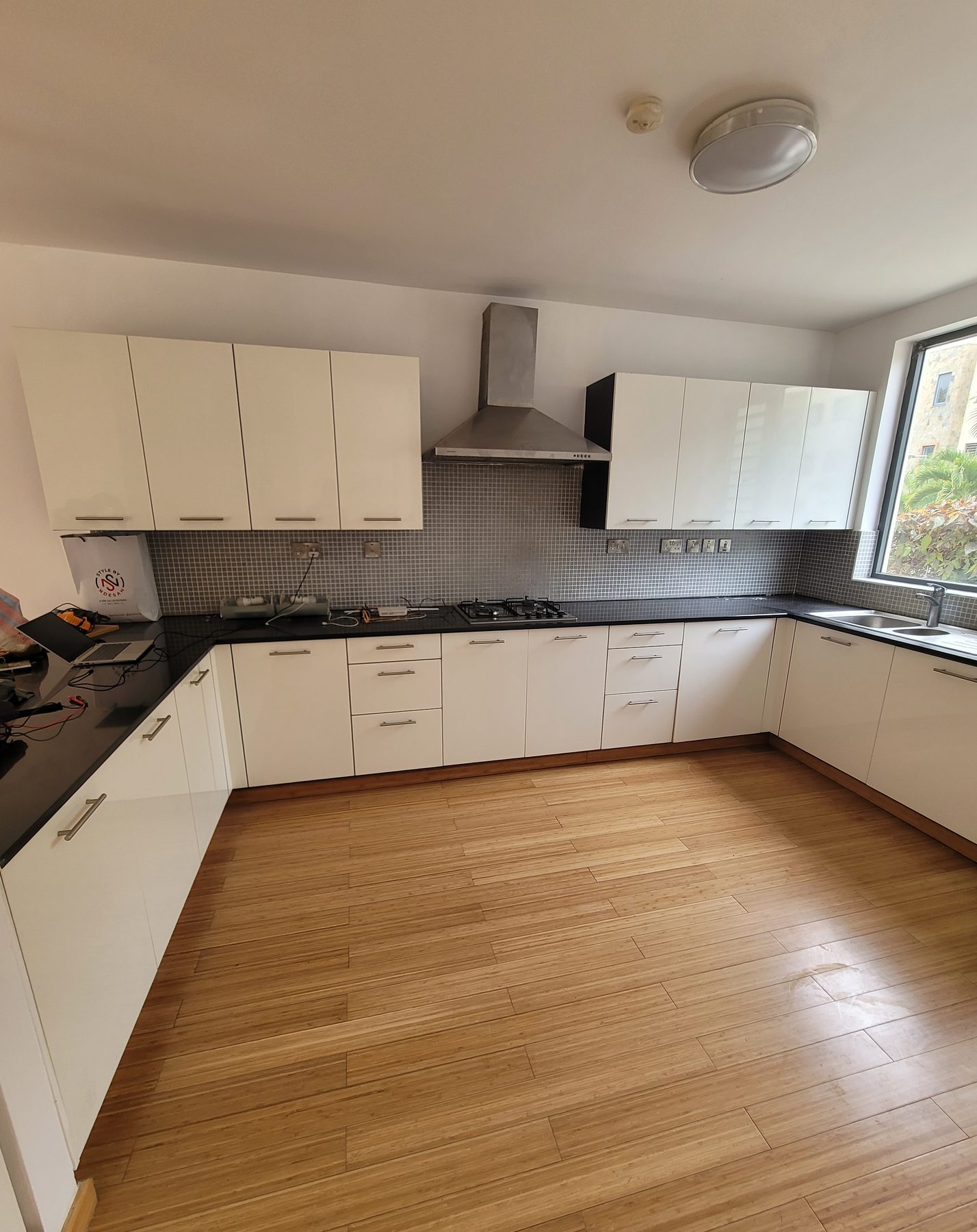 Fitted white kitchen cabinetry