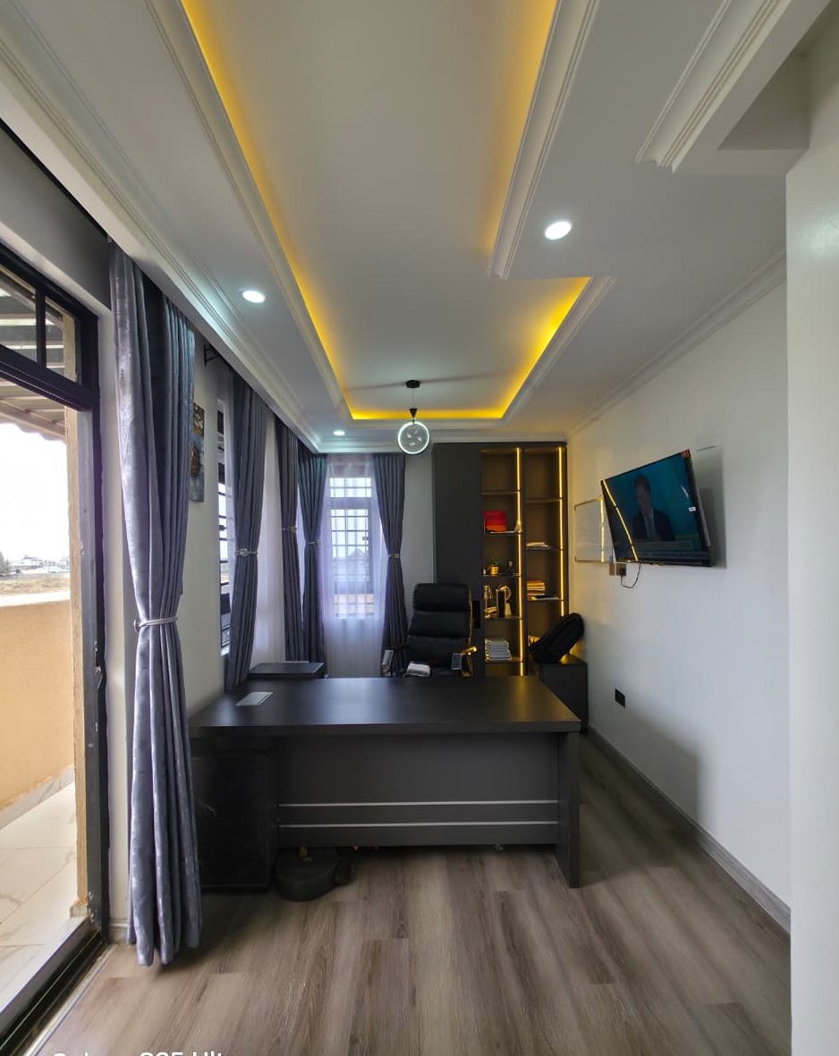 Office fit-out with a warm cove-lit gypsum ceiling